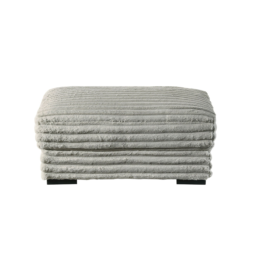 The Embrace Ottoman in gray is the perfect addition to your living space, offering both style and functionality. Crafted from 100% gray polyester fabric with a plush, blanket-like texture, it promises ultimate relaxation. This versatile piece can be used 