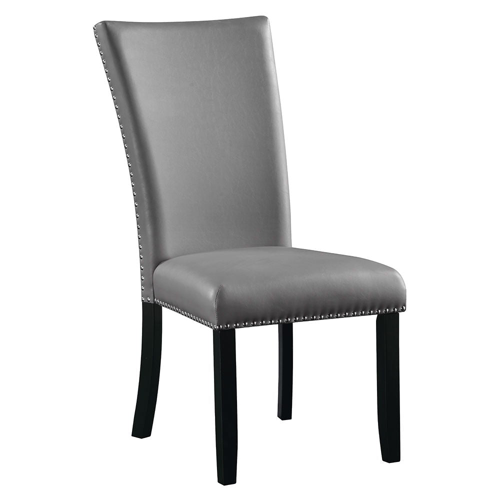 The Caralin dining set brings elegance and modern flair to any dining room. The rectangular table features a thick, engineered stone top with a U-shaped base, creating a stunning focal point. The fixed table top offers stability, while the upholstered cha