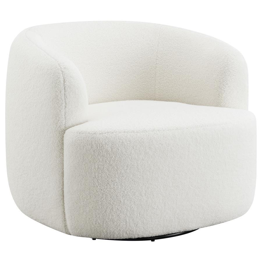Covered entirely in a plush faux sheepskin material, this swivel chair invites you to curl up and relax. Rotating a full 360 degrees, this accent chair is perfect for open floor plans and versatile spaces. The vintage-inspired barrel-like design offers ul