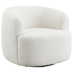 Covered entirely in a plush faux sheepskin material, this swivel chair invites you to curl up and relax. Rotating a full 360 degrees, this accent chair is perfect for open floor plans and versatile spaces. The vintage-inspired barrel-like design offers ul