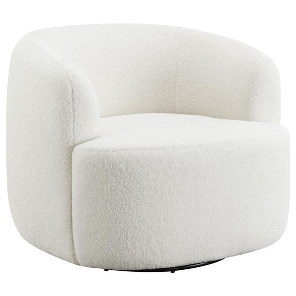Covered entirely in a plush faux sheepskin material, this swivel chair invites you to curl up and relax. Rotating a full 360 degrees, this accent chair is perfect for open floor plans and versatile spaces. The vintage-inspired barrel-like design offers ul