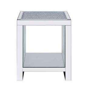  this brilliant square occasional table showcases a distinctive style for an intriguing look. The table features a fully mirrored beveled frame and tempered 