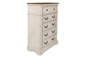 Complete your bedroom ensemble with the New Classic Furniture Anastasia 5 Drawer Chest in Antique White, a testament to real wood craftsmanship with solid poplar and oak veneer for enduring durability. The heirloom finish, achieved through a meticulous mu