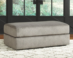  this oversized accent ottoman puts the contemporary in your contemporary home. Its ample surface space gives you elongated plushness for foot relaxation. And the microfiber fabric satisfies your need for a piece that f