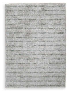 If thereâ€™s any rug that beckons you to slip off your shoes and sink your toes into true comfort, this area rug is it. Just imagine how good the plush woven shag will feel underfoot. And its dreamy, creamy color with sage stripes? The ultimate choice for