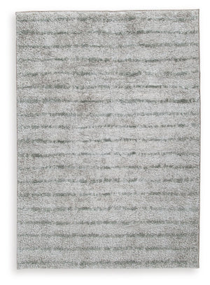 If thereâ€™s any rug that beckons you to slip off your shoes and sink your toes into true comfort, this area rug is it. Just imagine how good the plush woven shag will feel underfoot. And its dreamy, creamy color with sage stripes? The ultimate choice for