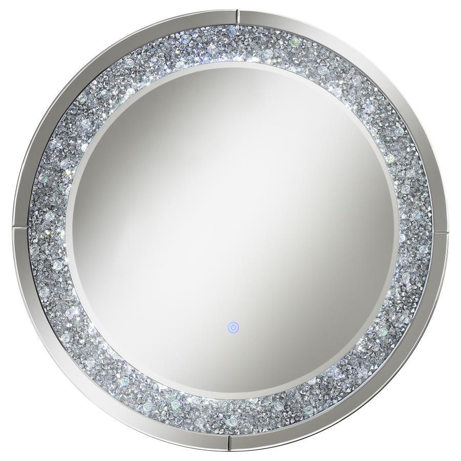 Accentuate your home with this cool, lively decorative wall mirror. The MDF and mirror construction brightens up a front hallway or walk-in closet. The silver hardware finish is highlighted by brilliant crystal accents that deliver glitz and glam. There-'