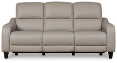 This power reclining sofa puts a sleek twist on laid-back living. It satisfies your desire for comfort without being bulky in design, thanks to subtly incorporated one-touch reclining and adjustable headrests. With chic exposed legs and stunning stitching