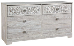 If itâ€™s coastal chic or cottage quaint style you long for, this whitewashed dresser invites you to go to town. Its distinctive weatherworn finish conveys an easy-breezy sensibility, perfect for a restful bedroom retreat. Tastefully edited lines and meda