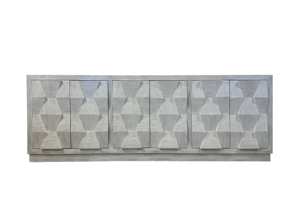 The Cortina console is a must-have for any unique home. It features a distinctive geometric design on the doors and a sturdy base for stability. This console has push-to-open doors for ease of use and is equipped with a hidden drawer and adjustable shelve