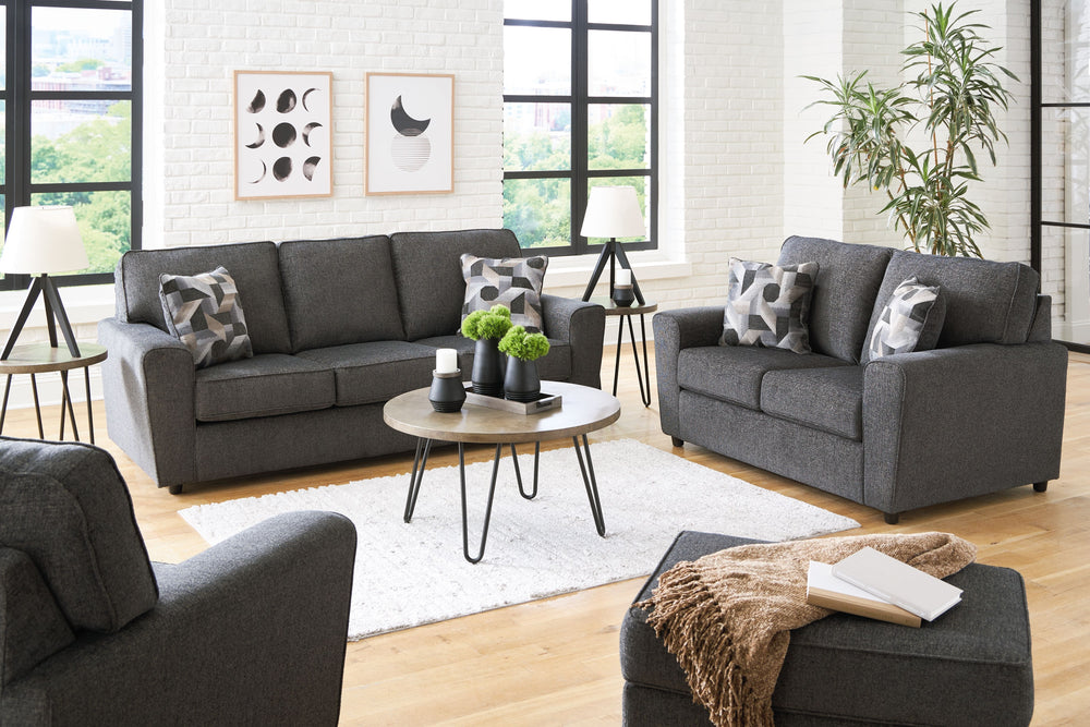 Revamp your sleekly styled living room sanctuary with this living room group. Well-suited to contemporary spaces with a calming neutral upholstery in slate gray, it makes a subtle design statement in your space whether youâ€™re hosting guests or enjoying 