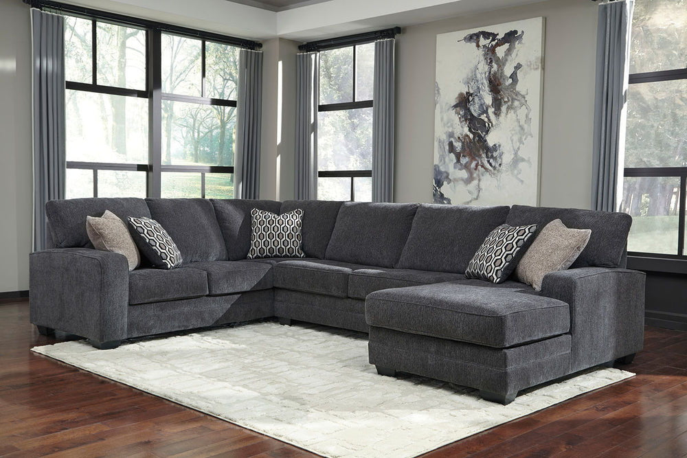 Talk about easy street. This effortlessly chic sectional puts you at the intersection of cool and comfortable. Ultra-deep seats are custom made for afternoon naps and movie night marathons. So plush to the touch, the sectionalâ€™s slate gray upholstery is