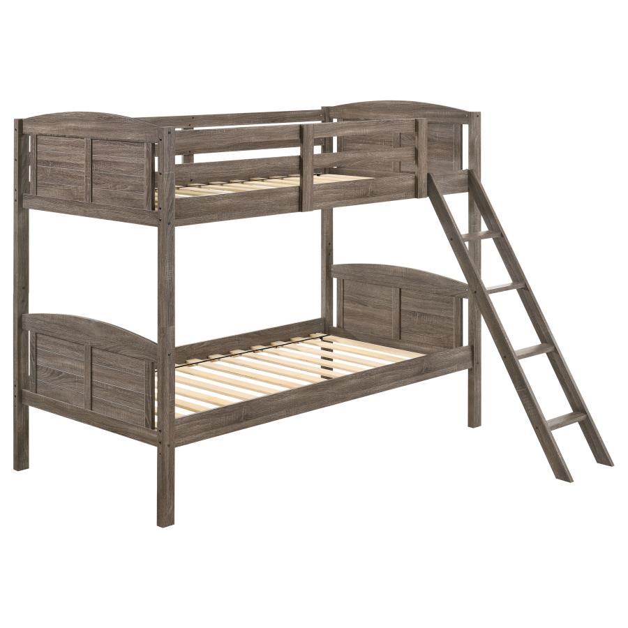 A casual country vibe carries the space with this rustic bunk bed, perfect for compact bedrooms and shared sibling spaces. A weathered brown finish lends a neutral hue to transform a space into a serene, restful retreat. Along the top bunk are safety guar