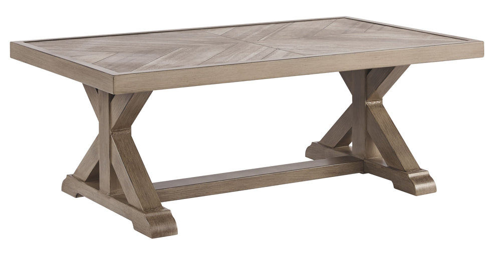 Sporting an easy-on-the-eyes look inspired by driftwood, this coffee table elevates the art of alfresco living. Beautiful and durable enough for indoor and outdoor use, the high-style/low maintenance table charms with X-leg farmhouse styling, while its th