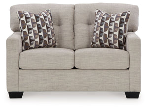  this loveseat invites you to say hello to approachable