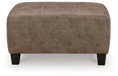 This decidedly modern oversized accent ottoman proves less is more, bringing simply inviting style to your living room. Take the guesswork out of decoratingâ€”its warm faux leather has a universal appeal, pairing with casual and contemporary aesthetics al