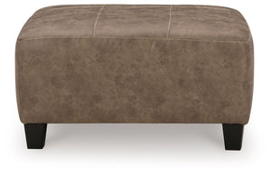 This decidedly modern oversized accent ottoman proves less is more, bringing simply inviting style to your living room. Take the guesswork out of decoratingâ€”its warm faux leather has a universal appeal, pairing with casual and contemporary aesthetics al