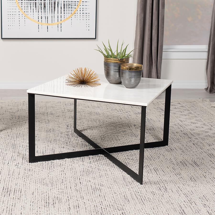 An attractive square shape begins the design path of a glam-inspired coffee table toned down with a hint of industrial style. Turn a casual or semi-formal living room or family room into a gallery of architectural and artisan design. Start with a coffee t
