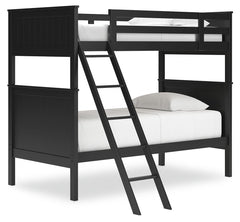 Maximize space and turn your kids-' bedtime into an adventure with this cool twin-over-twin bunk bed. It-'s an effortless addition to any bedroom, with a timeless Shaker style that-'s wonderfully finished in black. Guard rails on the top bunk help everyon