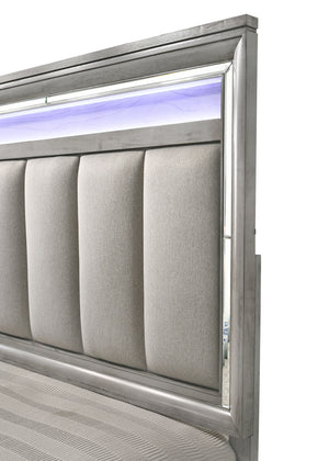  with integrated LED lighting on the tufted headboard adding a luxurious focal point. The collection includes a bed