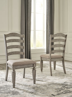We love how the classic farmhouse ladderback chair gets a fresh makeover in this dining room chair. Understated yet rich with character, the antiqued gray finish allows the woodâ€™s natural grain to shine through. Crisp, clean and neutral, the cushioned s