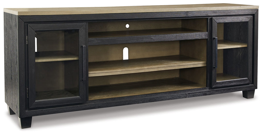 This TV stand with fireplace option is rustic, casual contemporary style simply done right. Its two-tone color scheme features a rich brushed black finish accented with a dusty grayish brown wood tone. With two glass-front cabinets (each with an adjustabl