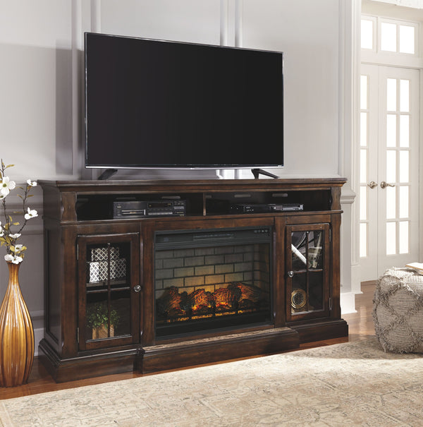 The beauty of this TV stand will immediately engage you. The slight breakfront shape is a rare find and an ideal fit among traditional and eclectic tastes. Soft black undertones highlight the warm finish. Multiple cubbies and glass-door enclosed shelves o