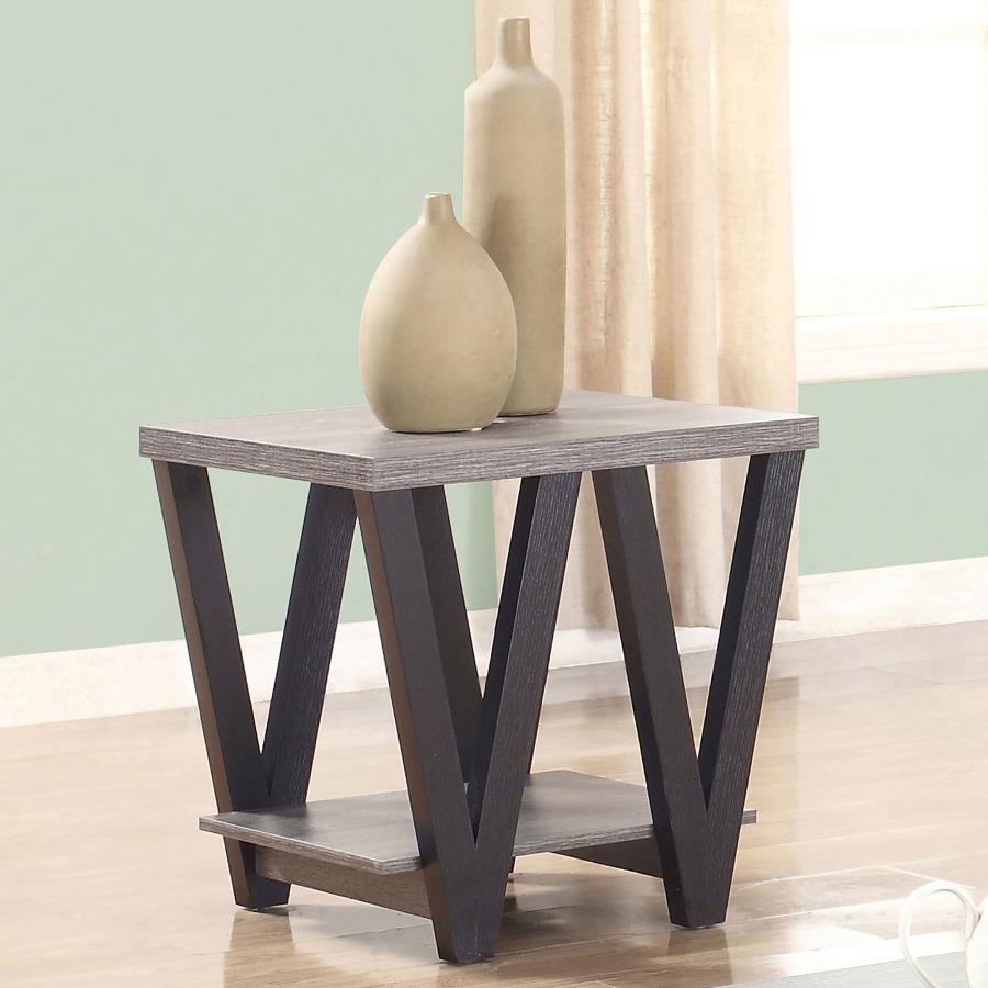 This modern end table combines style and functionality, perfect for contemporary living spaces. The square grey wood-look top and lower shelf, crafted from engineered wood with a durable laminate veneer, provide ample surface area and storage. Black "V"-s