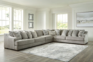 Get a leg up on comfort with this sectional. Sumptuously soft smoke gray upholstery welcomes you with open arms. A versatile performer, this stylish sectional steps in as a contemporary spot for impromptu entertaining. <h4><b>Bayless - Smoke - LAF Sofa</b