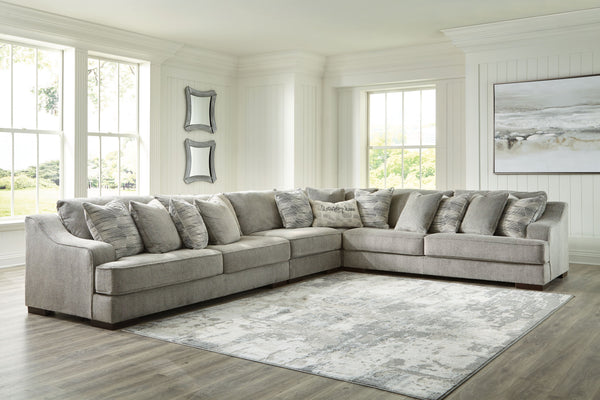 Get a leg up on comfort with this sectional. Sumptuously soft smoke gray upholstery welcomes you with open arms. A versatile performer, this stylish sectional steps in as a contemporary spot for impromptu entertaining. <h4><b>Bayless - Smoke - LAF Sofa</b