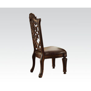  Armless Chair Backrest: Cut-Out Floral Backrest (Wood & Poly-Resin) Padded Seat: PU with Nailhead Trim Wooden Seat Apron with Molding Trim Wooden Tapered Leg: Floral Motif<br/><br/><b>Product Features</b><ul><li>Armless Chair</li><li>Padded Seat Cushi