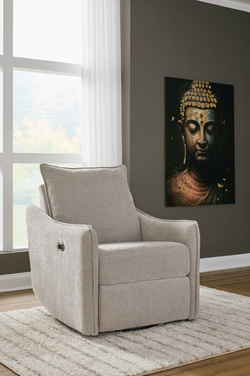 Elegance meets comfort. This swivel power recliner seamlessly blends style and practicality. Its sleek design, adorned with luxurious velvet upholstery, invites you to unwind. Whether catching up on your favorite show or chatting with guests, this chair i