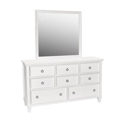 The Tamarack 8 Drawer Dresser and Mirror in white is a perfect blend of durability and elegance. Crafted with a combination of solid poplar, basswood veneers, and eco-friendly manufactured wood, this set ensures strength and long-lasting durability. Its v