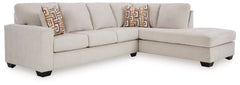Looking to make a simply chic statement with color? Liven up your living room with this sectional with chaise. Its trend-right light neutral upholstery is a perfect blank canvas for adding pops of color. Bold and eclectic accent pillows complete the look.