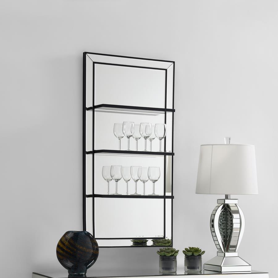 Present decor, bedroom essentials, and more along this modern glam wall mirror. Designed with an elongated, vertical mounting silhouette, this elegant wall mirror offers three narrow shelves to keep anything from perfumes to family photos. Covered entirel