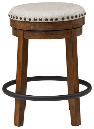  while nailhead trim brings effortless style. A softly upholstered cushion seat in beige keeps things c