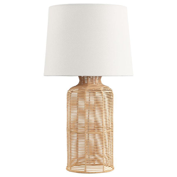 This table lamp seamlessly combines natural textures with modern elegance. Featuring a handcrafted rattan base in a cylindrical shape, it exudes a warm and organic appeal. The neutral fabric shade beautifully complements the rattan, softly diffusing light