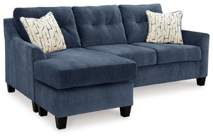 Urban contemporary meets mid century (with a pop of trend-right color) in this queen sofa chaise sleeper. Supremely soft upholstery, teeming with luster and movement, finesses the piece with just the right touch. Gently flared arms and tufted back cushion
