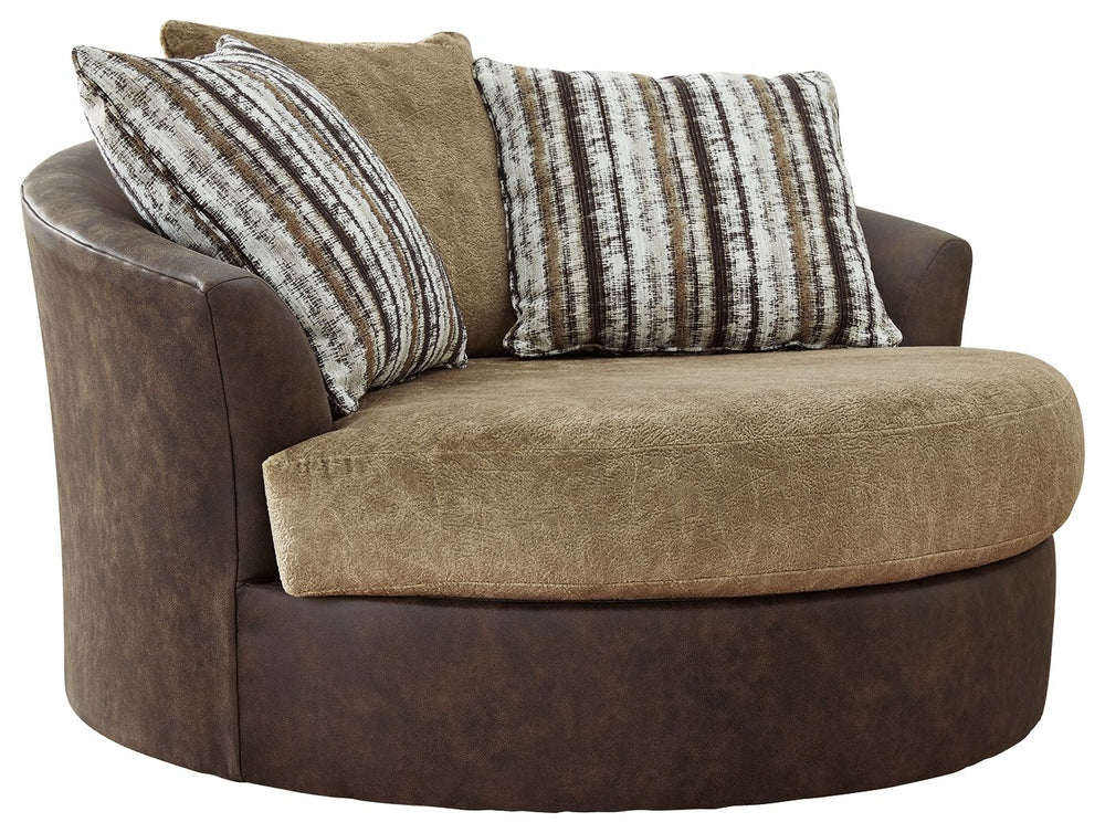 This oversized swivel accent chair is perfect for those who love the look of leather. Two textural tones provide twice the style and comfortâ€”and incorporate an added layer of visual interest. By allowing you to swivel, this chair marries the best of for