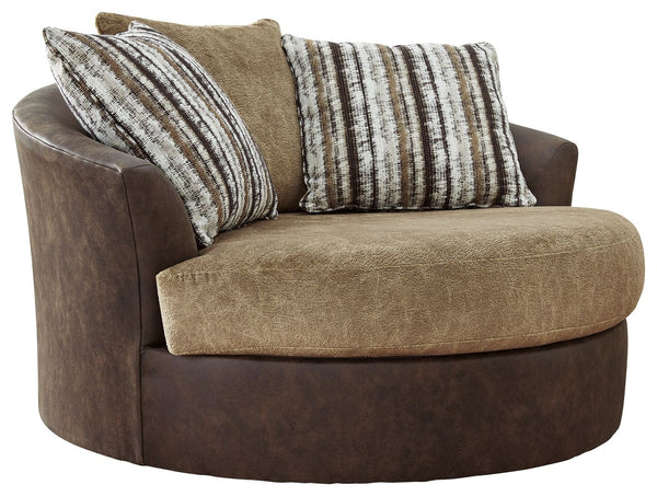 This oversized swivel accent chair is perfect for those who love the look of leather. Two textural tones provide twice the style and comfortâ€”and incorporate an added layer of visual interest. By allowing you to swivel, this chair marries the best of for