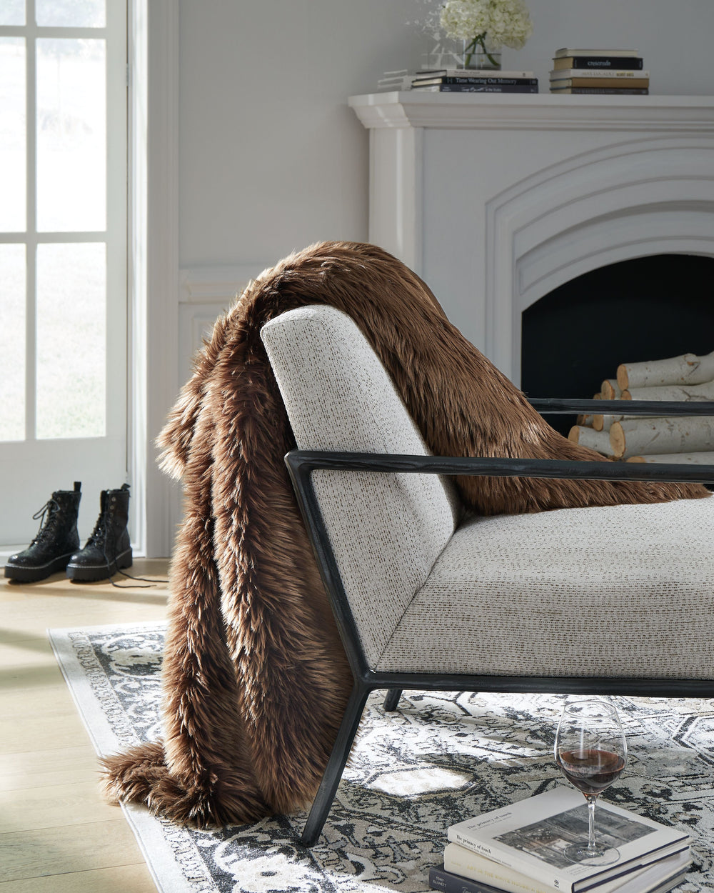 Indulge your taste for luxury with this throw. Its delicious faux fur texture adds a dreamy decadence to your reading nook or napping chair. A soft, soothing neutral tone makes the sumptuous throw a natural fit.<br/><br/><b>Product Features</b><ul><li>Acr