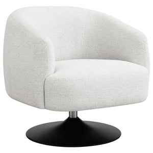 Wrapped in a beige boucle fabric, this contemporary swivel accent chair is the perfect addition to a vintage-inspired home. A throwback to a retro era, the chair offers a barrel style design situated on a pedestal base, swiveling 360 degrees. A wonderful 