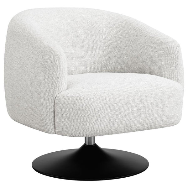 Wrapped in a beige boucle fabric, this contemporary swivel accent chair is the perfect addition to a vintage-inspired home. A throwback to a retro era, the chair offers a barrel style design situated on a pedestal base, swiveling 360 degrees. A wonderful 