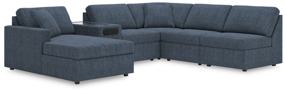 Looking cool and contemporary is great. But when it comes down to it, youâ€™re all about low-maintenance lounging. With the performance fabric on this sectional with chaise, cleaning spills is a breeze. Its customizable modular design caters to your ever-