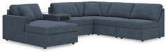 Looking cool and contemporary is great. But when it comes down to it, youâ€™re all about low-maintenance lounging. With the performance fabric on this sectional with chaise, cleaning spills is a breeze. Its customizable modular design caters to your ever-