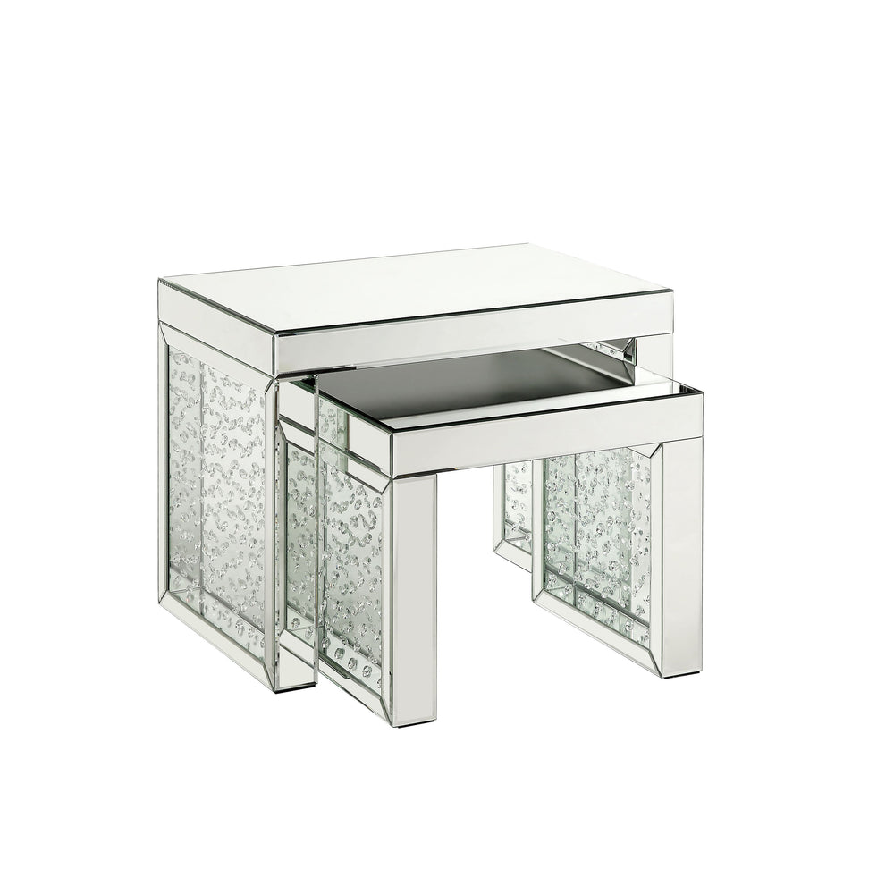Go full glam with this Nysa Accent Table. The brilliant mirrored table top and glistening faux crystals inlay will reflect light and make any room appear larger. It provides a spacious table top ample enough for displaying various decor items while the sl