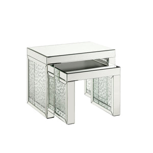 Go full glam with this Nysa Accent Table. The brilliant mirrored table top and glistening faux crystals inlay will reflect light and make any room appear larger. It provides a spacious table top ample enough for displaying various decor items while the sl