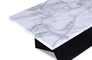  seamlessly combining luxury with a contemporary edge. The tables-' stark