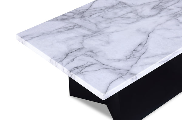  seamlessly combining luxury with a contemporary edge. The tables-' stark