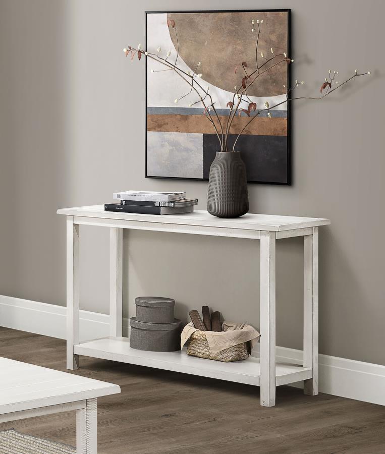 Crafted to complement both entryways and living rooms, this console table showcases a rustic aesthetic and versatile appeal. Fashioned from pine wood and reinforced with engineered wood, its open lower shelf provides ample space for baskets or decorative 